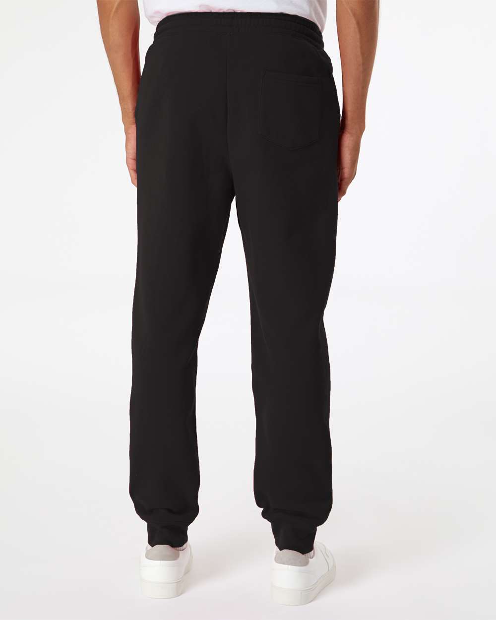 Back view of black unisex fleece joggers from The Bronze Collective showing the back pocket and elastic waistband