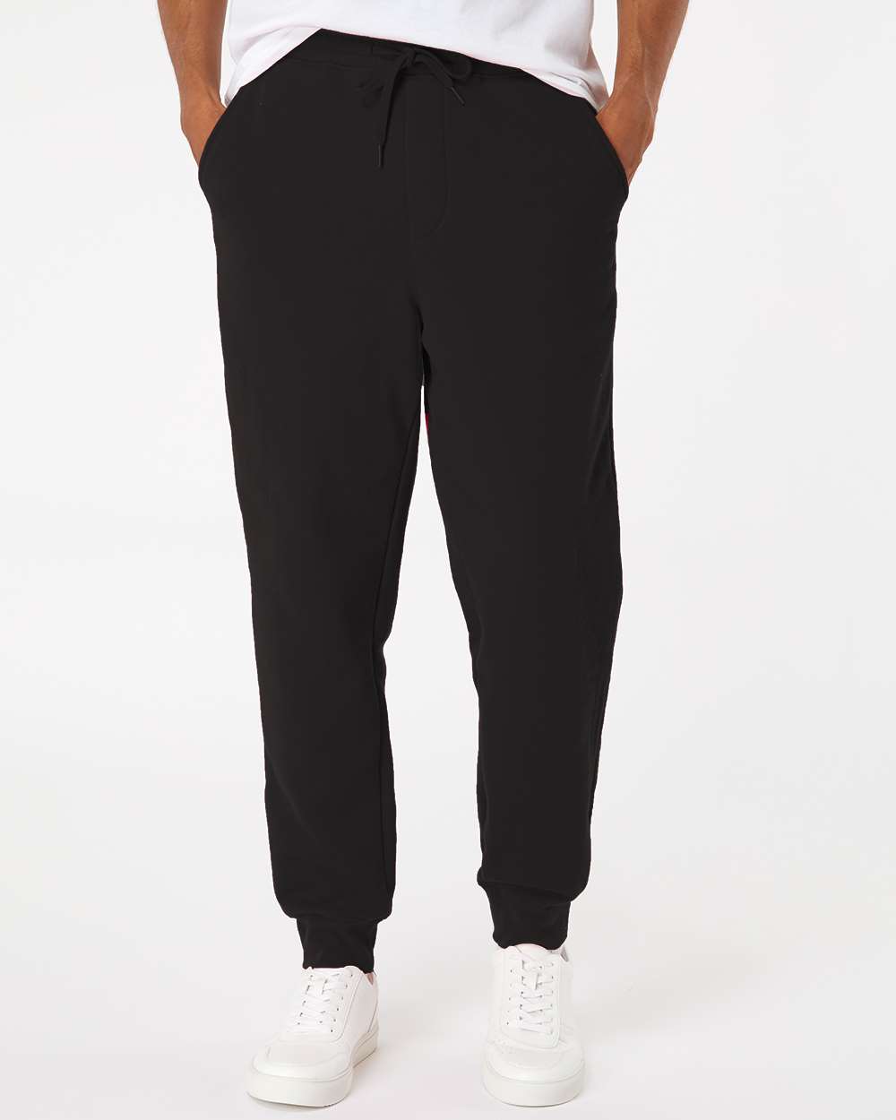Front view of black unisex fleece joggers from The Bronze Collective with a drawcord waist and ribbed ankle cuffs